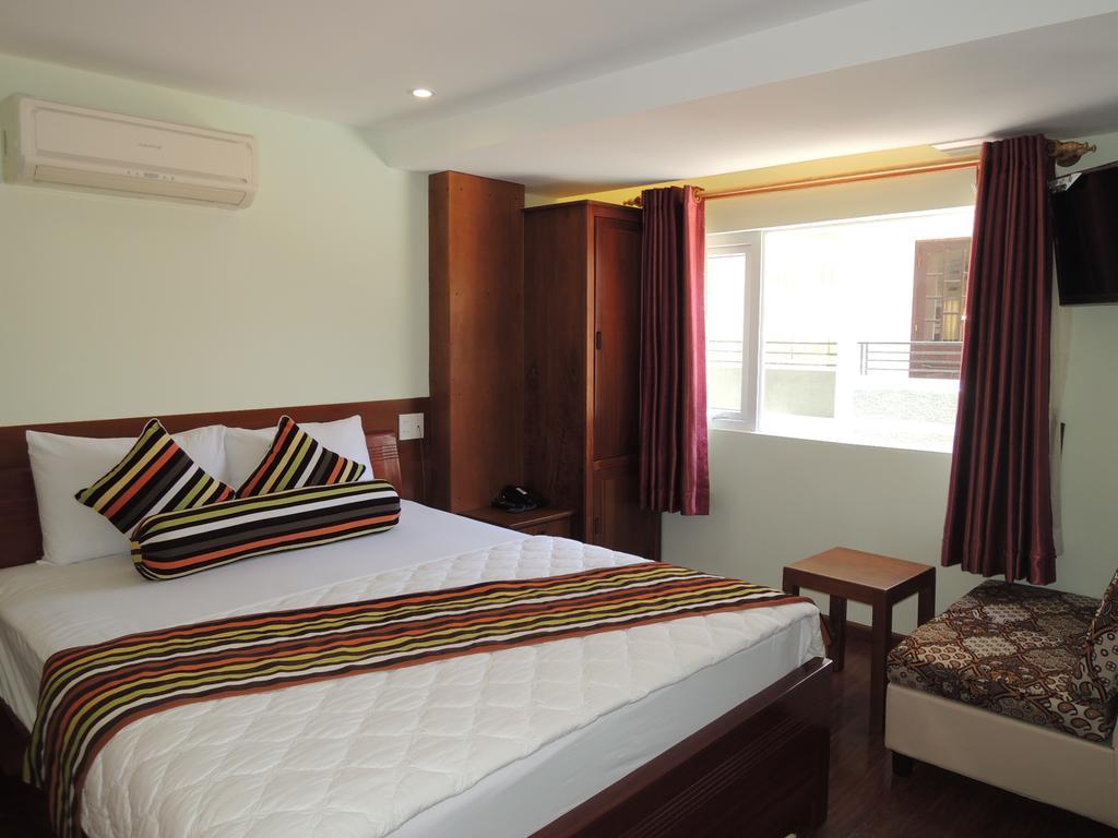 Art Deluxe Hotel Nha Trang Rum bild